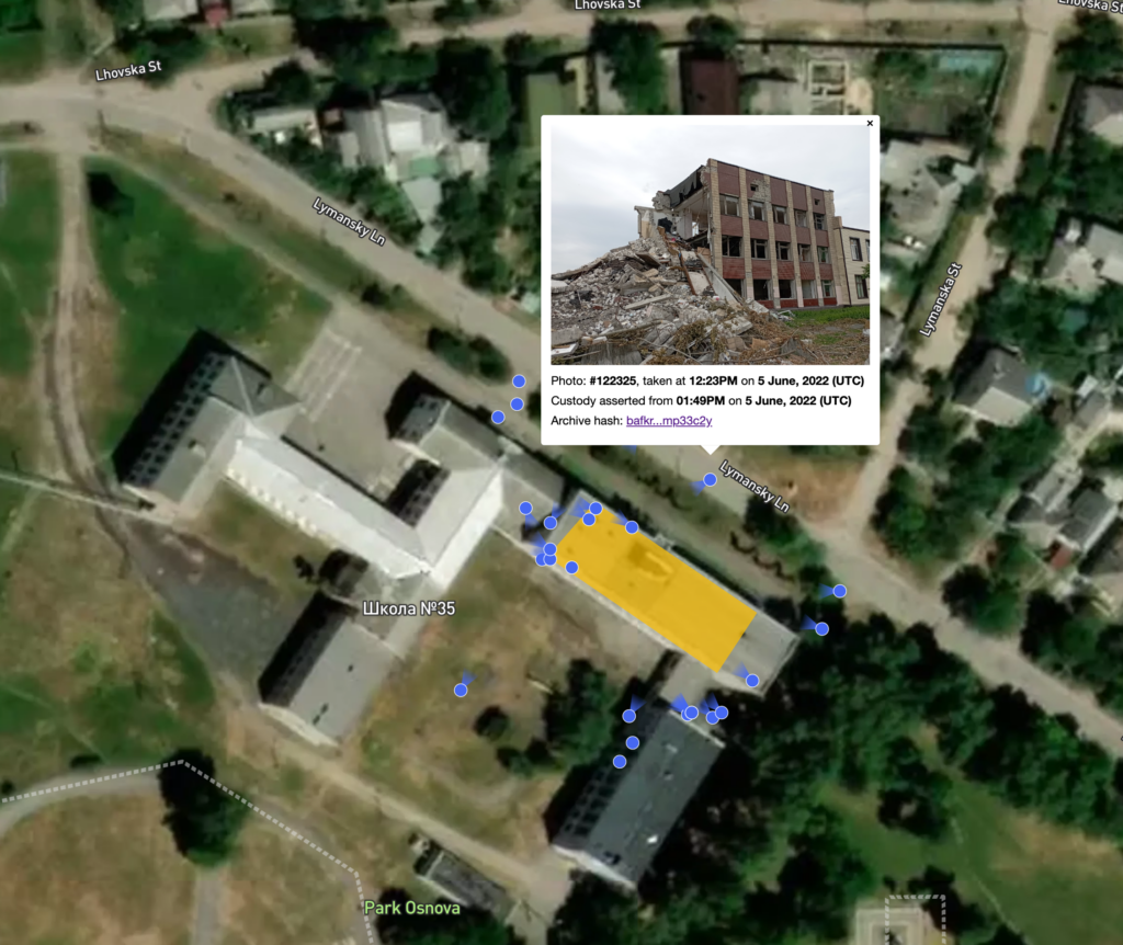 One of the photographs, presented in situ and in the context of the school’s geography and the other images, displaying in addition integrity data of the photograph.